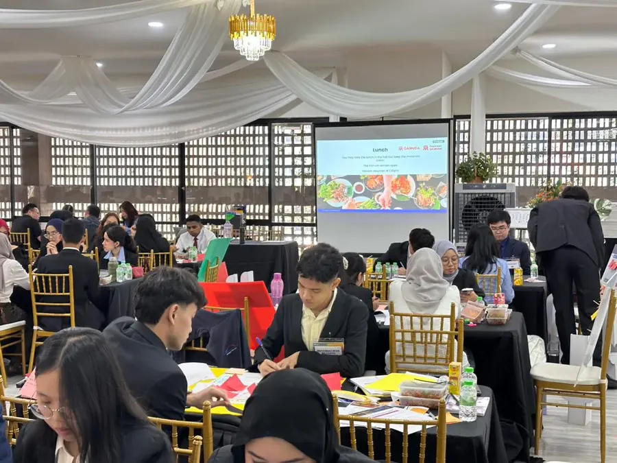 Corporate workshop participants working in groups